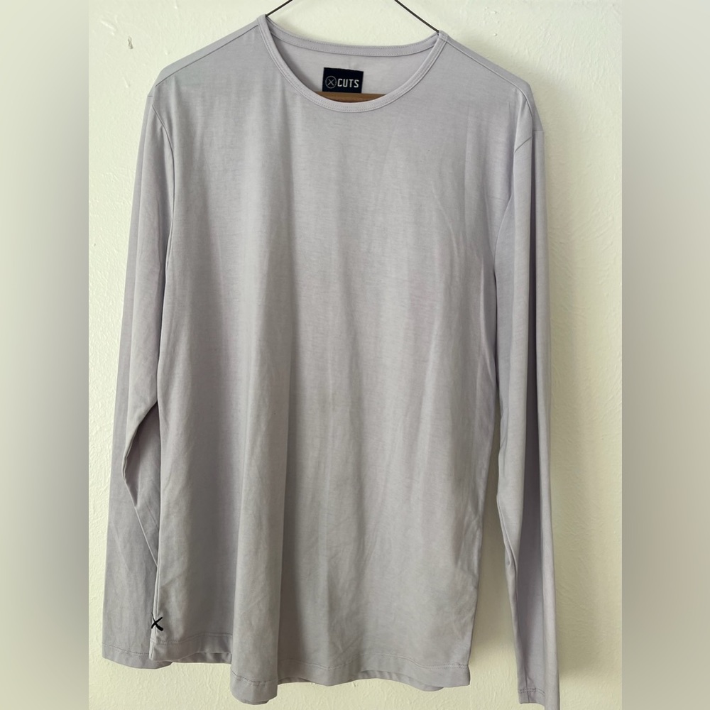 Cuts clothing long sleeve top